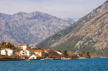 Small town at the foot of the mountains. Bay of Kotor, Prcanj, Montenegroの写真素材