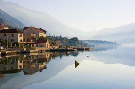 Beautiful Mediterranean landscape on a misty day. Montenegro, winter . View of Bay of Kotor (...