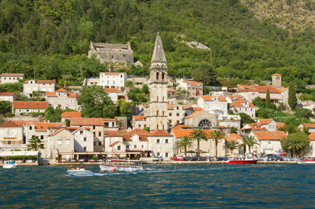 Summer view of ancient town of Perast with bell tower of St Nicholas church. Bay of Kotor, Montenegroのeditorial素材