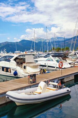 View of yacht marina of Porto Montenegro on cloudy autumn day.  Montenegro, Adriatic Sea, Bay of Kotor, Tivat cityの写真素材