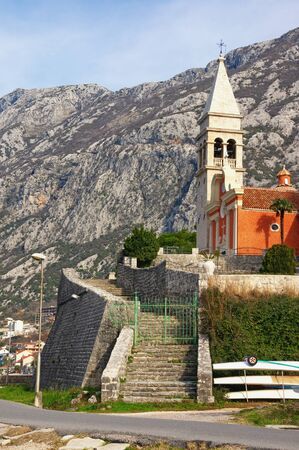 Winter Mediterranean landscape. Montenegro, view of Dobrota town. Baroque Catholic Church of St. Matthewの写真素材