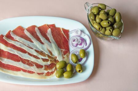 Balkan cuisine . Slices of prsut: dry-cured ham,  Balkan version of prosciutto. Space for textの写真素材