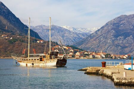 Beautiful Mediterranean landscape on sunny winter day. Montenegro,  Bay of Kotor, Dobrota town. Prcanj town in the distanceの写真素材