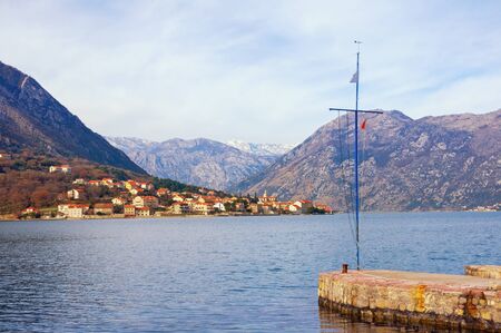 Beautiful winter Mediterranean landscape. Montenegro, Adriatic Sea. View of Kotor Bay from town of Dobrota.  Prcanj town in the distanceの写真素材
