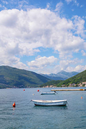 Beautiful summer Mediterranean landscape - blue sky and blue bay. Montenegro, Adriatic Sea, view of the Bay of Kotor near the city of Tivatの写真素材