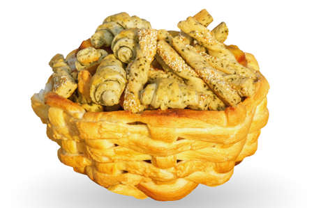 Homemade cakes. Basket with pastries isolated on a white backgroundの写真素材