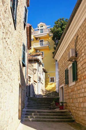 Old narrow street in Mediterranean city. View of Old Town of Herceg Novi. Montenegroの写真素材