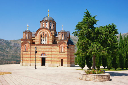 Religious architecture. Bosnia and Herzegovina. Trebinje city. View of Orthodox monastery - Hercegovacka Gracanica - on sunny summer dayのeditorial素材