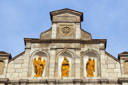 Cetinje / Montenegro - February 24 2020 : View of building of old Austrian-Hungarian embassy. Upper zone of the main facade, figures of Virgin Mary with Christ between two angels are placed in three nichesのeditorial素材