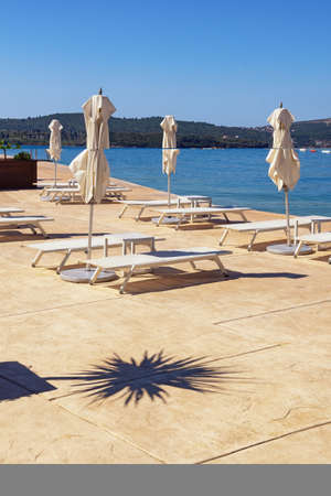 Summer beach vacation concept.  Montenegro,  Adriatic Sea, Bay of Kotor, Tivat cityの写真素材
