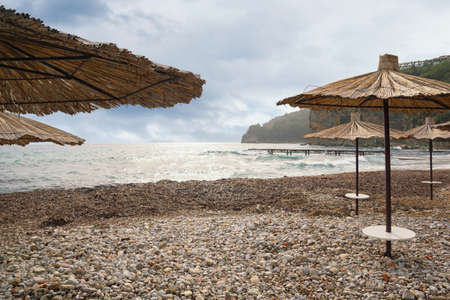 Montenegro. Coast of Adriatic Sea near Old Town of Budva on cloudy autumn dayの写真素材