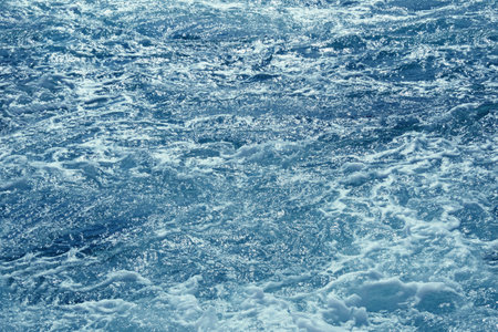 Sea water, illuminated by sun. Adriatic Sea. Abstract natural texture, horizontal seamless backgroundの写真素材
