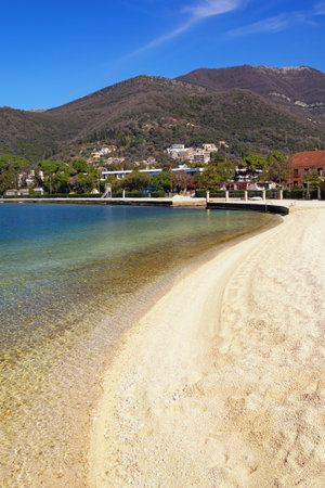 Sunny  winter Mediterranean landscape -  sky, sea and deserted beach.  Montenegro, Adriatic Sea, view of Kotor Bay near Tivat cityの写真素材