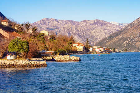 Beautiful winter Mediterranean landscape. Montenegro, Adriatic Sea, View of Bay of Kotor and Prcanj townの写真素材