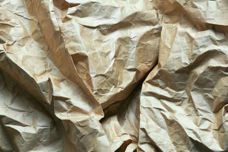 Brown old crumpled paper. Texture, backgroundの写真素材