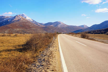 Road trip through the Balkans. Winter landscape with road in valley of Dinaric Alps.  Bosnia and Herzegovina, Republika Srpskaの写真素材