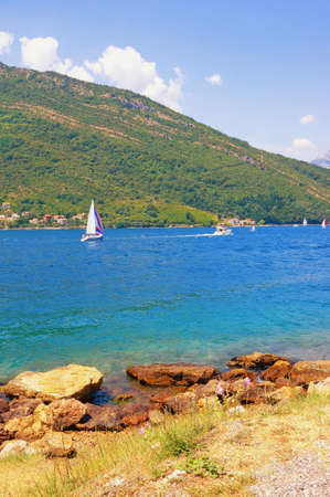 Beautiful summer landscape. Montenegro, Adriatic Sea. View of Kotor Bay with sailboats on waterの写真素材