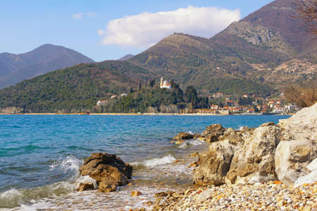 Beautiful Mediterranean landscape on sunny day. Montenegro, Adriatic Sea. View of Kotor Bay near verige Strait, Kamenari village with Church of Sveta Nedeljaの写真素材