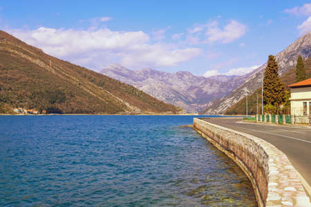 Beautiful Mediterranean landscape. Montenegro, view of Kotor Bay near Verige Strait and Adriatic Highway running along the coastの写真素材