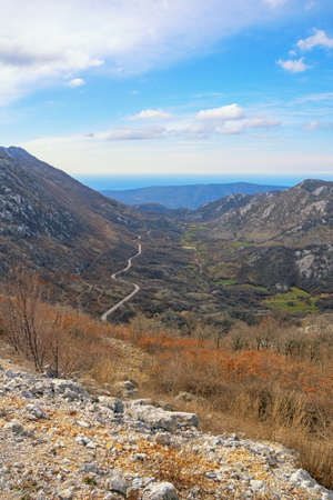 Beautiful mountain landscape. Mountain range of Dinaric Alps on sunny day in early spring. Adriatic Sea in distance. Bosnia and Herzegovina, Republika Srpskaの写真素材