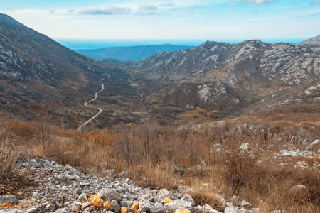 Beautiful mountain landscape. View of mountain range and valley of Dinaric Alps on sunny day of early spring. Bosnia and Herzegovina, Republika Srpskaの写真素材