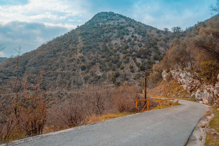Balkan road trip. Mountains landscape with  winding country road. Montenegro, Tivatの写真素材
