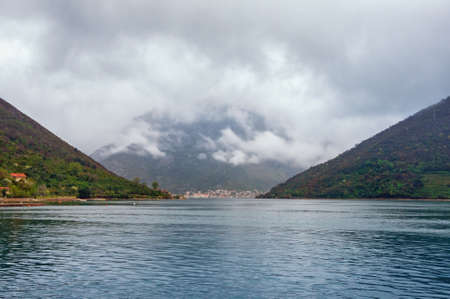 Foggy spring day. Beautiful Mediterranean landscape. Montenegro, Adriatic Sea, Bay of Kotor. View of the Verige Straitの写真素材