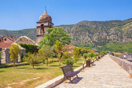Montenegro, Kotor Old Town - UNESCO World Heritage Site.  View of the picturesque promenade on Old Town Wall. Bell tower of Saint Clare Churchの写真素材