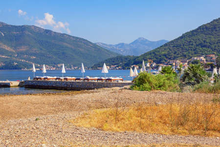 Summer beach vacation. Beautiful Mediterranean landscape on sunny summer morning. Montenegro, Bay of Kotor, Tivatの写真素材