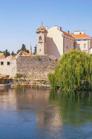 View of Old Town of Trebinje and Trebisnjica River on sunny summer day. Bosnia and Herzegovina, Republika Srpskaの写真素材