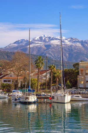 Beautiful winter Mediterranean landscape. Boats in harbor on sunny day. Montenegro,  Bay of Kotor. Tivat city,  view of marina Kalimanjの写真素材