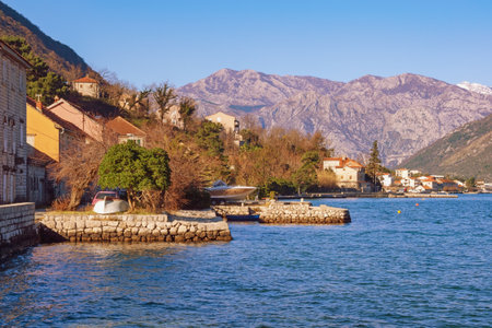 Beautiful Mediterranean landscape on sunny winter day. Montenegro, Adriatic Sea, Kotor Bay.  View of Prcanj townの写真素材