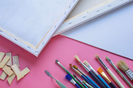 Different paintbrushes and canvas. Education and art concepts.  Copy spaceの写真素材