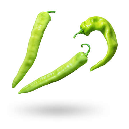 Bright green hot peppers isolated on white backgroundの写真素材