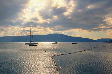 Sunset. Beautiful Mediterranean landscape. Montenegro, Adriatic Sea. View of Bay of Kotor near Tivat city, autumnの写真素材