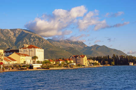 Beautiful Mediterranean landscape. View of embankment of Tivat city on sunny autumn day. Montenegro, Adriatic Sea, Bay of Kotorの写真素材