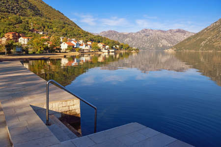 Beautiful Mediterranean landscape on sunny autumn day.  Montenegro, Adriatic Sea. View of  Bay of Kotor near Prcanj townの写真素材