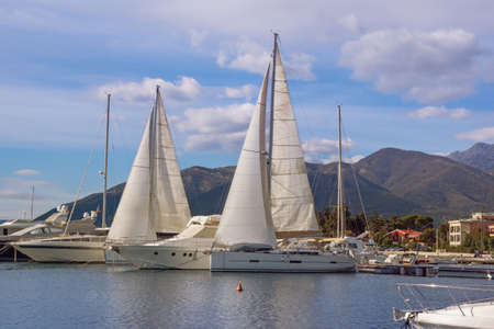 Sailboats and yachts in harbour. Beautiful winter Mediterranean landscape. Montenegro, Adriatic Sea, view of Kotor Bay near Tivat cityの写真素材