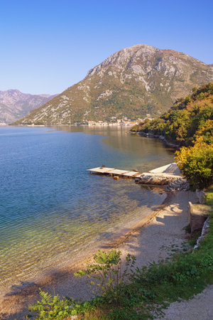 Beautiful Mediterranean landscape on sunny autumn day. Montenegro, Adriatic Sea. View of Bay of Kotor near Verige Straitの写真素材