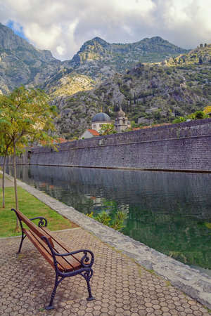Walls of ancient fortress of Old Town of Kotor in autumn day.  Skurda river. Montenegroの写真素材