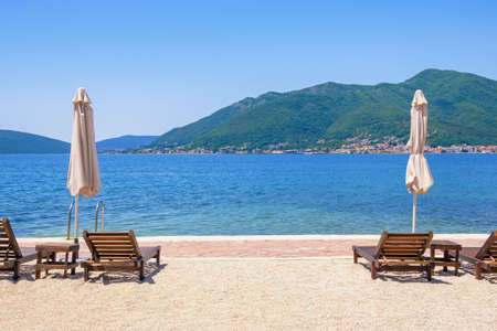 Summer beach vacations, sunny day at the beach.  Montenegro, Adriatic Sea, view of Bay of Kotor near Tivat city. Space for textの写真素材