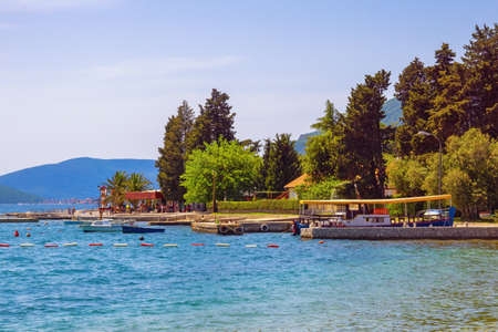 Sunny spring day, beautiful Mediterranen landscape. Vacation concepts. Montenegro, Adriatic Sea. View of Bay of Kotor near Tivat cityの写真素材
