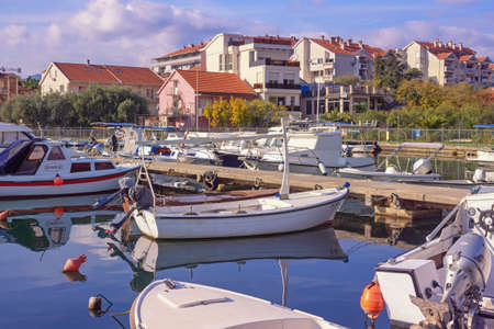Tivat , Montenegro - November 13 2021:  Kalimanj Marina in Tivat city on sunny autumn day. Montenegro, Adriatic Seaの写真素材