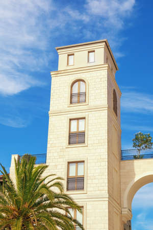 Montenegro, Tivat city, architecture. Tower of building on embankmentの写真素材