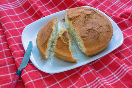 Balkan cuisine. Slices of cornbread on white plateの写真素材