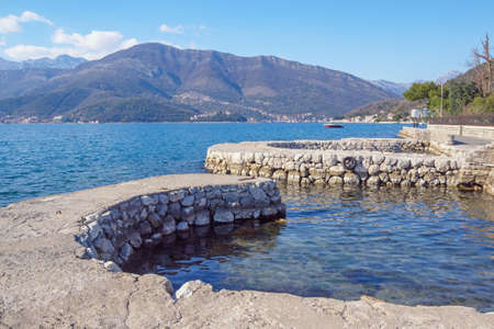 Winter Mediterranean landscape. Montenegro, Tivat. Mandrac (mandrach) is dry stone jetty, cultural heritage in Kotor Bayの写真素材