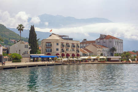 Beautiful Mediterranean landscape.   Montenegro. View of Tivat city on cloudy spring day