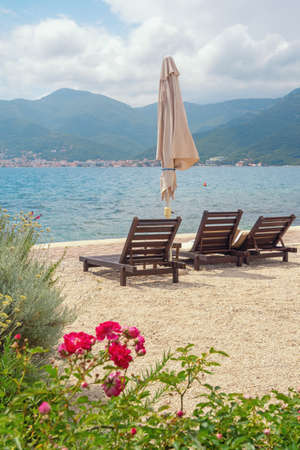 Beach vacation.  Beautiful Mediterranean landscape. Montenegro, Adriatic Sea, view of Bay of Kotor near Tivat city on cloudy spring dayの写真素材
