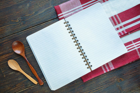 Recipe book on kitchen table. Copy spaceの写真素材