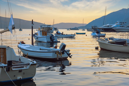 Evening Mediterranean landscape with boats on water. Montenegro,  Kotor Bay, Tivatの写真素材